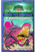 Szkoła przy cmentarzu W paszczy aligatora