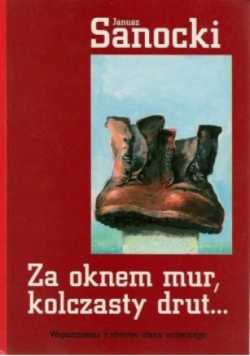 Za oknem mur kolczasty drut