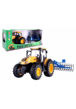 Traktor rolniczy z broną talerzową