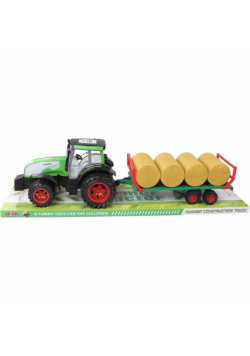 Traktor gigant z belami siana